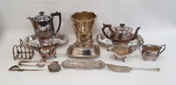 Silver plated three-piece tea set, a silver plated mug, silver plated serving dishes, toast rack,