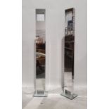 Pair of floor-standing lights in mirrored finish Condition Report Some marking to surface. No