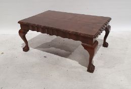 20th century figured wood coffee table of rectangular form, moulded wavy edges, on cabriole legs,
