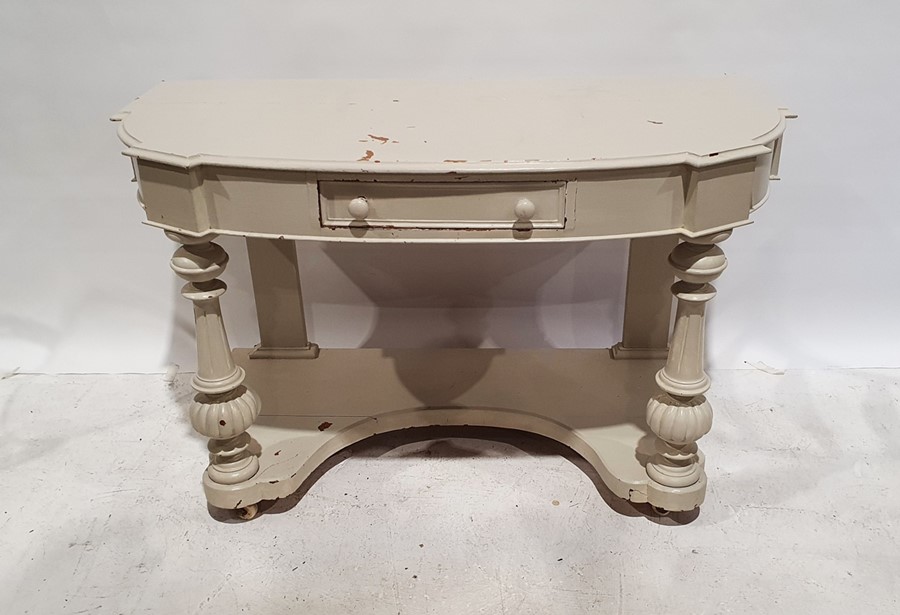 Painted and shabby chic style hall table, the shaped bow front with single drawer, on turned and