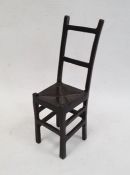 Bronze model of a chair, 19cm high