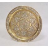 Middle Eastern brass dish of circular form with inlaid copper and silvered decoration, 24.5cm