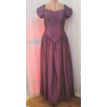 Various evening dresses to include a taffeta purple evening dress, a velvet and chiffon dress