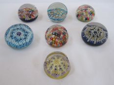 Three Strathearn millifiore paperweights and four other millefiori paperweights (7)