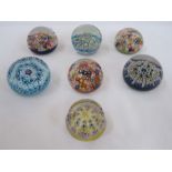 Three Strathearn millifiore paperweights and four other millefiori paperweights (7)