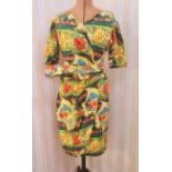 1950's-style short cotton dress with a front draped waist, a green raw silk full-length dress with