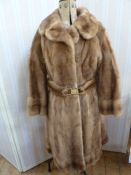 1970's mink coat, A line, banded hem and cuffs, matching belt with brass coloured buckle