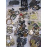 Box of assorted buttons and buckles dating from the 1930s - 1970s etc.