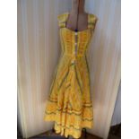 Jeff Banks yellow striped sundress, full skirt and tiered hemline, front button fastening and a