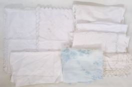 Assorted table linen to include Mountmellick table cover, nightdress case, etc., 20 plus (1 box)