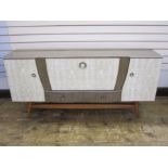 Mid 20th century melamine sideboard with full front flanked by pair of cupboards and two drawers
