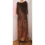 1980's and later, a black chiffon evening dress with firework design in sequins, velvet bodice