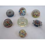 Strathearn millefiori paperweight, five other millefiori paperweights and a multi-coloured