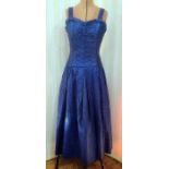 1950's vintage and later, a blue satin textured evening dress with frilled bodice and drop waist,