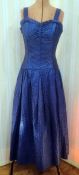 1950's vintage and later, a blue satin textured evening dress with frilled bodice and drop waist,