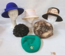 Assorted hats to include a knitted 1960/70's hat with plastic discs and a black net and velvet hat