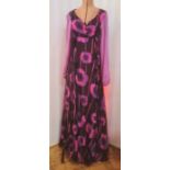 Vintage 1960's/70's, a maxi dress in black and purple with printed poppies, sweetheart neckline,