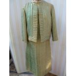 A gold and green textured cocktail dress and jacket, full length evening dress in printed chiffon,