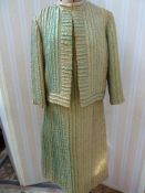 A gold and green textured cocktail dress and jacket, full length evening dress in printed chiffon,