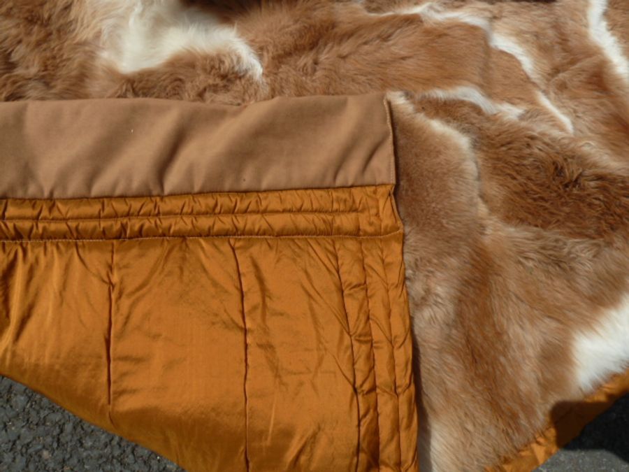 A (Llama) Guanaco throw, backed by gold coloured satin, labelled Hockley, 231 x 241 cms  and two - Image 2 of 4