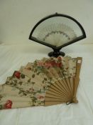 Bone, painted, brise fan - decorated with swags of flowers on both sides, within a fitted fan