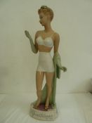1940's plaster painted female figure advertising underwear for 'Youth Lines by WB', 71 cms h. some