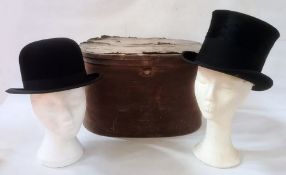 Black top hat labelled Dingley & Son, Hatters, Sherborne, with a black bowler, labelled inside, size