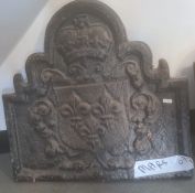 Cast iron fireback with shield decoration surmounted by a crown, the shield three fleur-de-lys