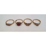 Three-stone ring set small diamonds, two solitaire illusion-set diamond rings and a red stone set