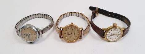 Lady's gilt metal strap watch, the dial inscribed Longines, with baton markers, on expanding