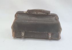 Circa 1920's midwife bag with various surgical instruments