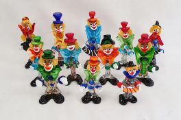 12 assorted Murano glass clowns including musicians, the tallest 26cm high (12)