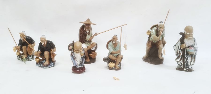 Five pottery models of Chinese fishermen and two other figures (7)