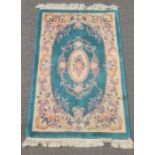 Chinese superwash green ground rug