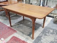 20th century oak Arts and Crafts style rectangular table, turned and ringed supports and five