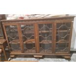 Late 19th/early 20th century bookcase with egg and dart moulded cornice above four astragal-glazed