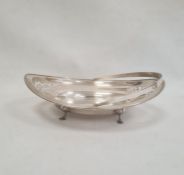 1920s silver oval cake basket, pierced decoration on splayed feet, swing handle, Birmingham 1922,