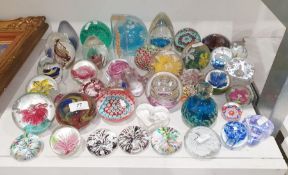 Large quantity of glass paperweights including one of marbled design by Michael Harris, Isle of