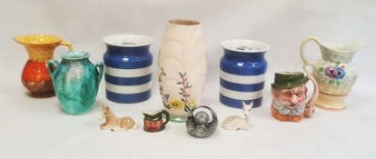 Pair of Green's Cornish ware lidded jars, a character jug, a Caithness paperweight 'Adventure' and