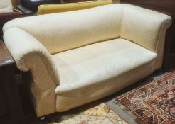 Late Victorian Chesterfield drop-arm sofa in pale yellow diamond patterned upholstery, turned