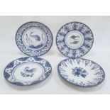 Four modern Spanish blue and white dishes decorated with birds, fish and flowers, within stylised