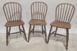 Three elm seated stick-back chairs and one further armchair (4)