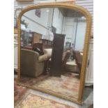 C Nosotti, late Victorian large arch-topped overmantel mirror in moulded frame, with plaque to