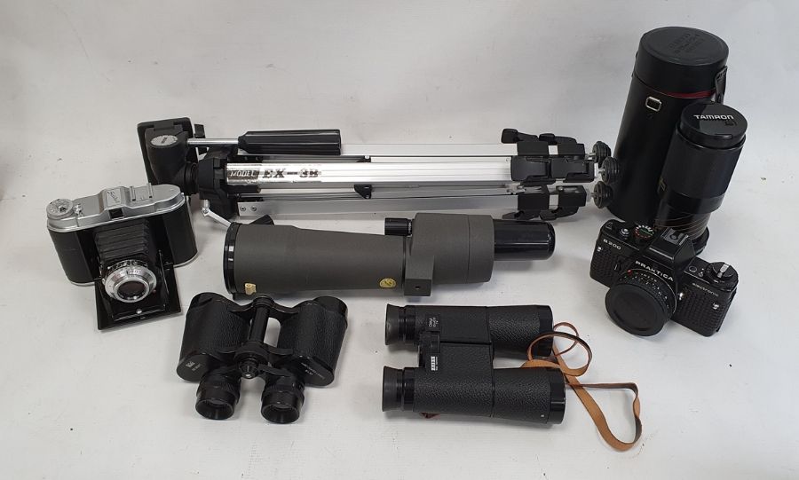 Pair of Zeiss 10x40 binoculars, a Praktica B200 camera, a pair of Regent 8x30 binoculars in