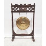 Brass dinner gong on frame