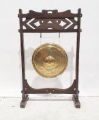 Brass dinner gong on frame