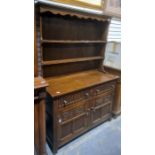 20th century oak dresser, shelves above two drawers, two cupboard doors, 122cm x 176cm