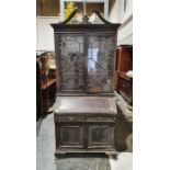 Circa 1920's Georgian style bureau bookcase, swan neck pediment above the astragal glazed doors