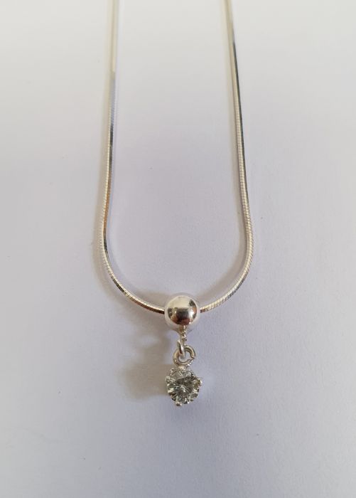 Solitaire diamond drop pendant, claw-set in silver mount, on fine chain, the stone approx 0.10ct - Image 3 of 4