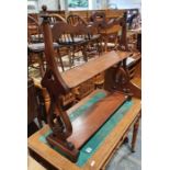 Late 19th century mahogany two tier bookcase on carved end supports, 90cm wide x 86cm tall